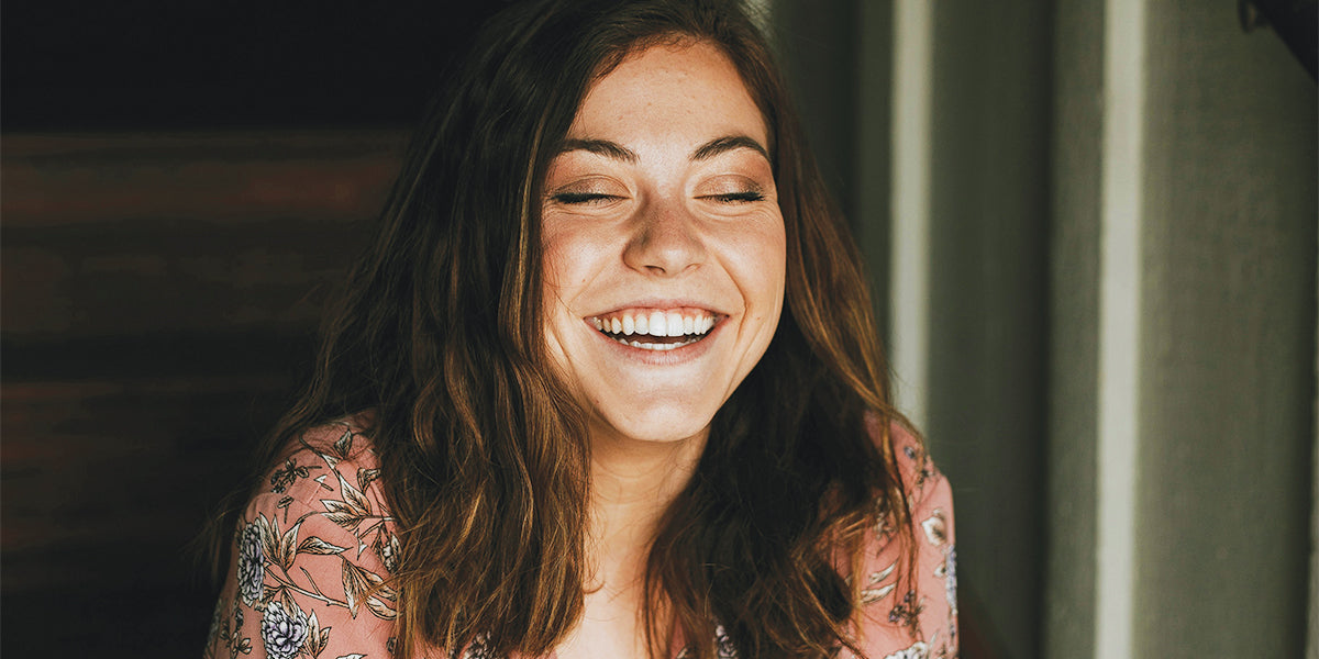 Woman with white teeth for sensitive teeth